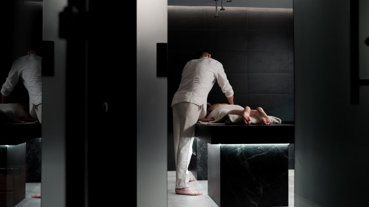 A relaxing massage in a modern spa room promoting wellness and self-care.