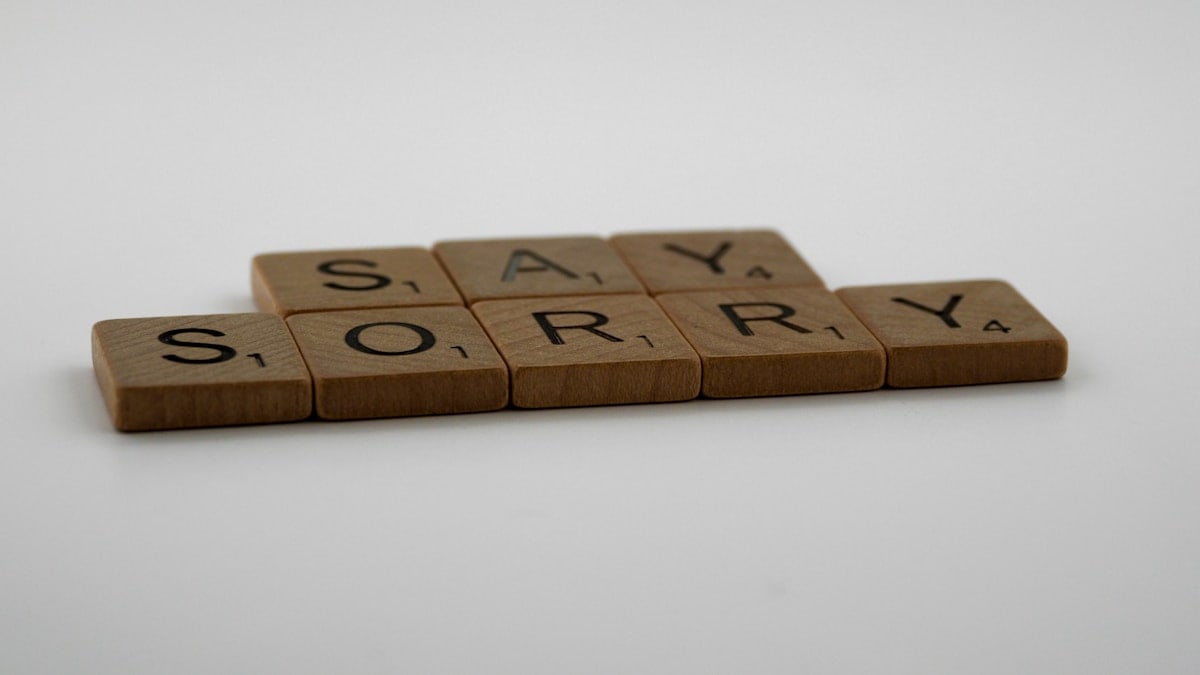scrabble, scrabble pieces, lettering, letters, wood, scrabble tiles, white background, words, type, typography, design, layout, i am sorry, sorry, apologise, say sorry, regret, make up, break up, mistake, hardest word,